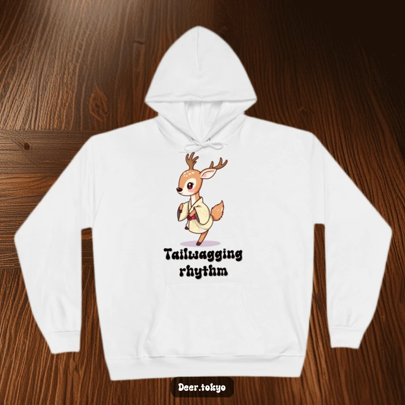 A deer playfully dancing in a traditional Japanese kimono, depicted on a warm and cozy hoodie.
